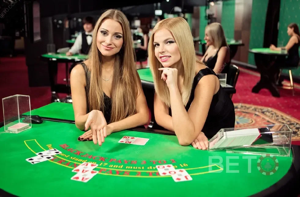 Suasana meja kasino live DIVA4D dengan dealer dan layar permainan